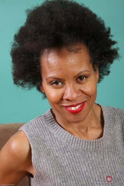 Ebony hairy mature Ariela spreading legs