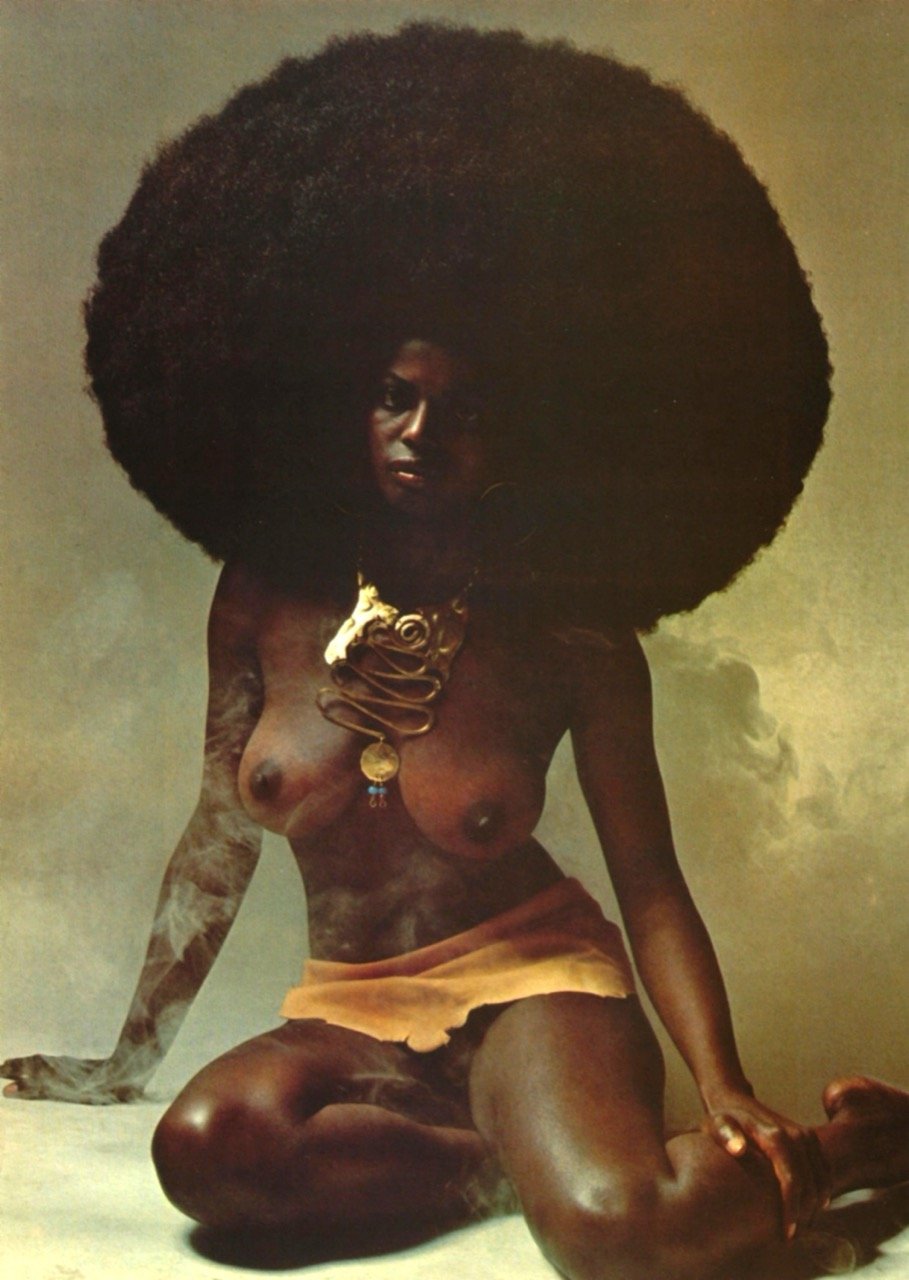 African beauty Azizi Johari posing for Playboy