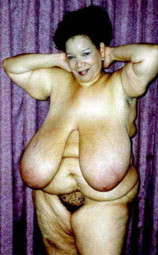 Ebony mature Cajun Queen baring big tits