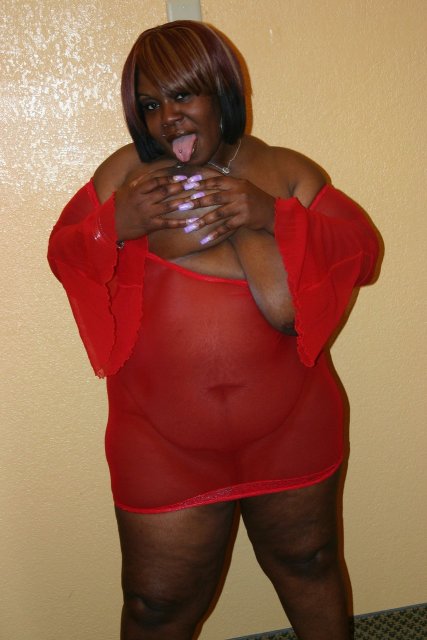 Black BBW Cherry Bomb baring big boobs and ass