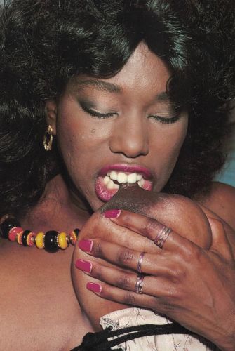 Ebony Ayes riding white cock