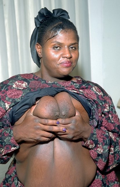 Black mature BBW Ervin Leland sucking white cock