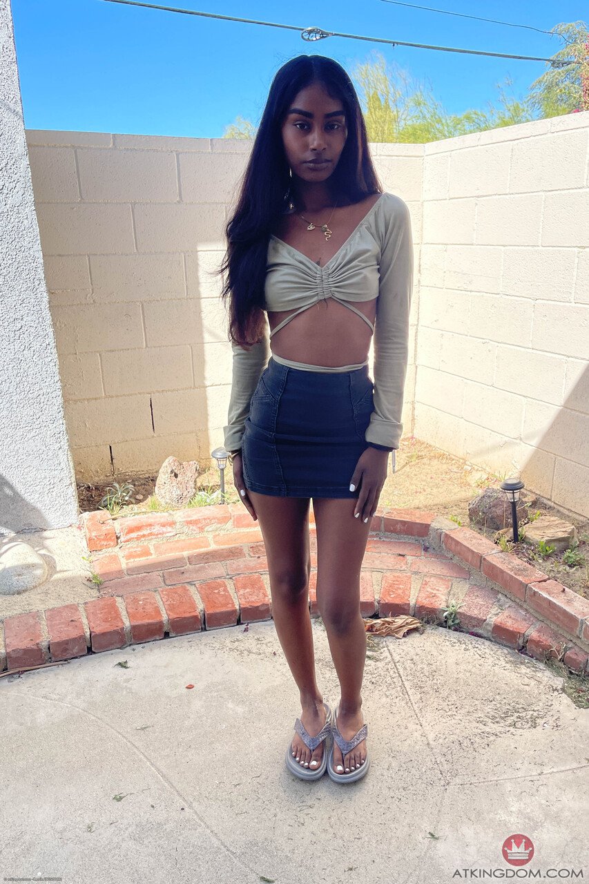 Ebony adorable Fae Love unveiling pussy