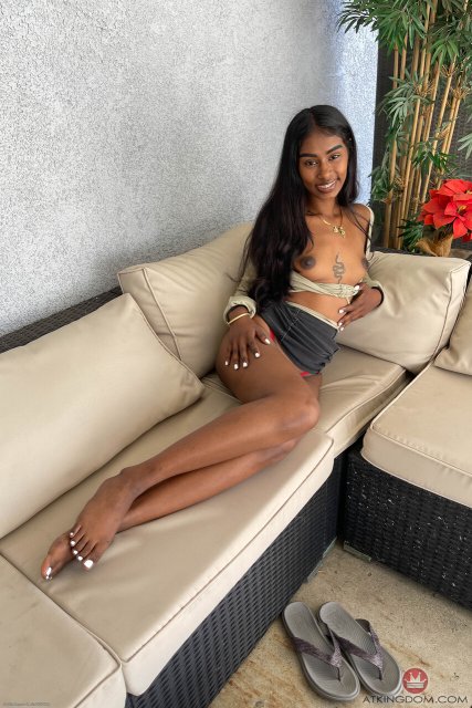 Ebony adorable Fae Love unveiling pussy