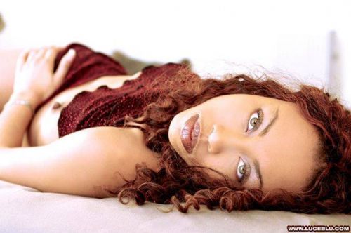 Black stunning Green Eyes getting naked