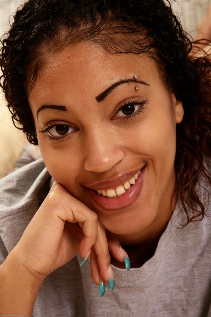 Ebony slender Karmalita baring hairy pussy