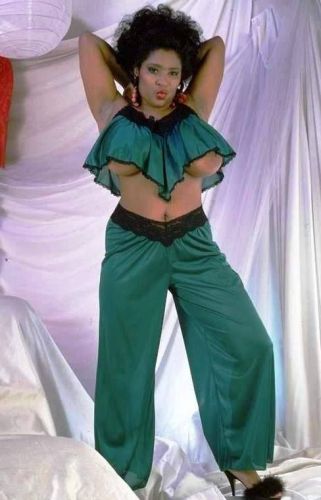 Busty La Tina baring her big tits