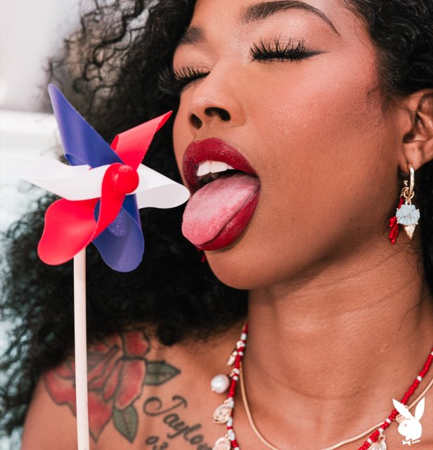 Black adorable Playboy model Mia Love posing nude