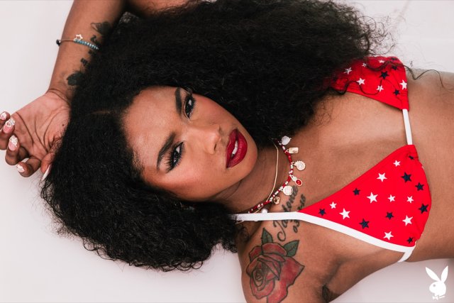 Black adorable Playboy model Mia Love posing nude