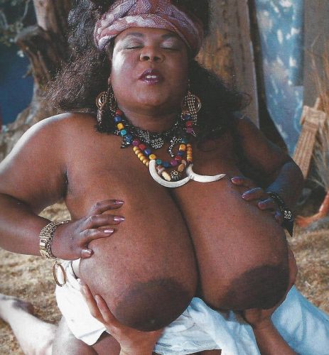 Black mature Miss Twin Towers riding white cock