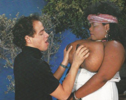 Black mature Miss Twin Towers riding white cock