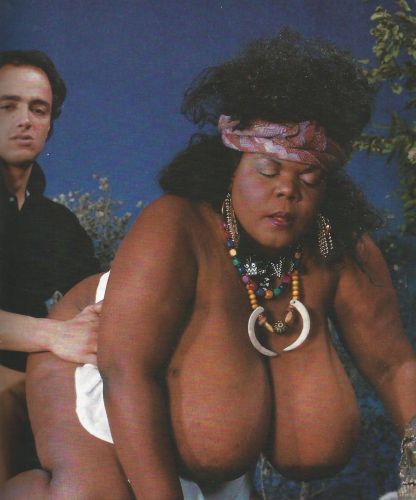 Black mature Miss Twin Towers riding white cock