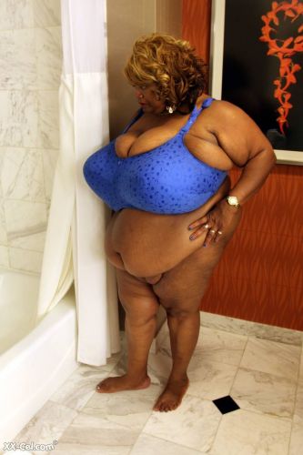 Black mature Norma Stitz barring giant tits