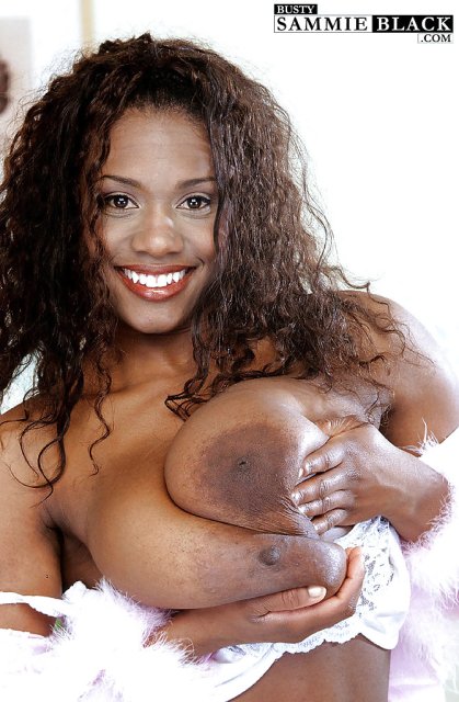 Sammie Black playing with her huge boobs