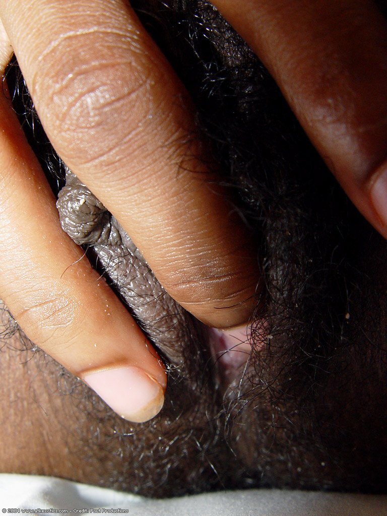 Black teen Satya spreading her hairy twat