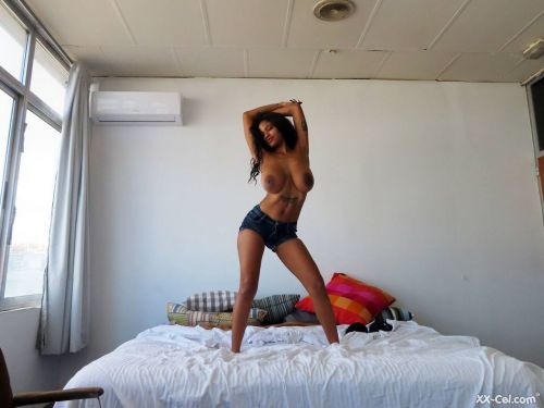 Busty ebony babe Tina Fire